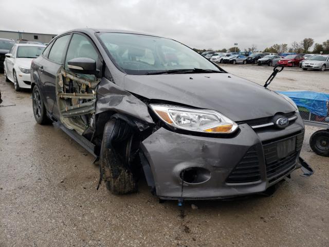 FORD FOCUS SE 2014 with VIN 1FADP3F24EL132830 - Photo from auction