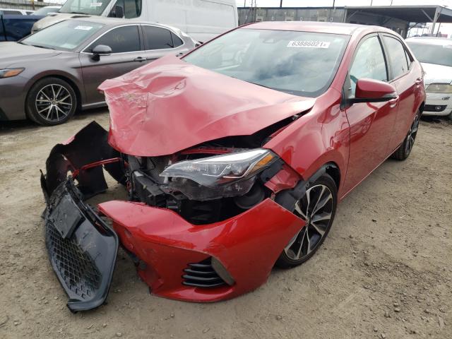 Photo 2 from auction – 2018 TOYOTA COROLLA L with VIN 5YFBURHE6JP819698