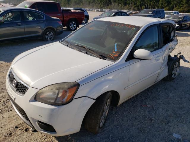 Photo 2 from auction – 2011 KIA RIO BASE with VIN KNADH4A39B6730271