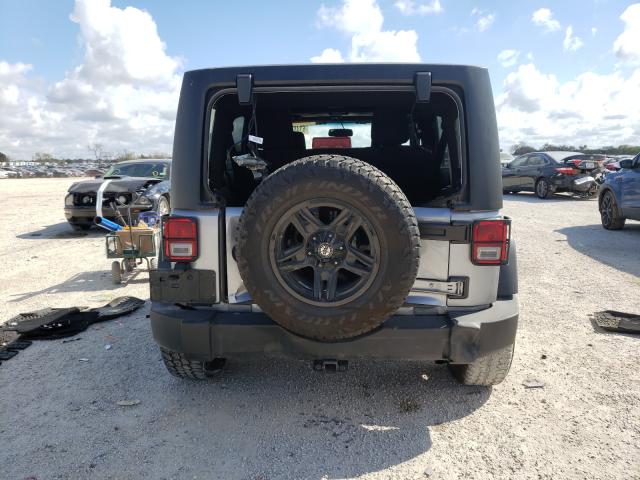 Photo 9 from auction – 2014 JEEP WRANGLER U with VIN 1C4BJWDG6EL320297