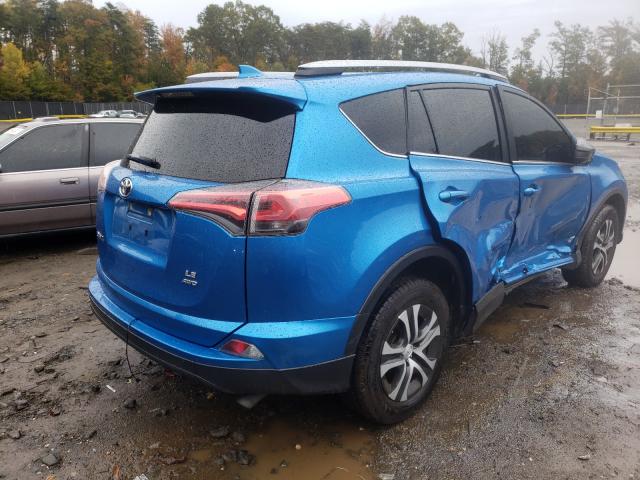 Photo 4 from auction – 2018 TOYOTA RAV4 LE with VIN JTMBFREV4JJ207373