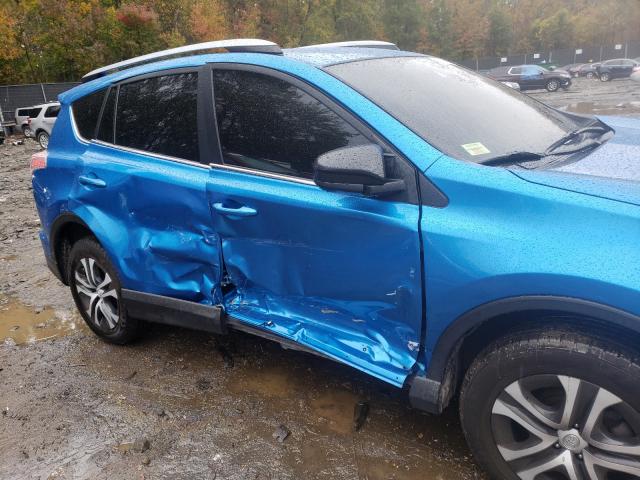 Photo 9 from auction – 2018 TOYOTA RAV4 LE with VIN JTMBFREV4JJ207373