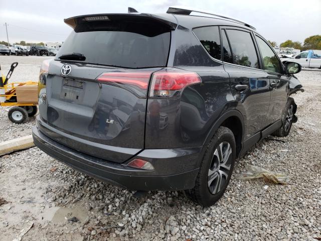 Photo 4 from auction – 2016 TOYOTA RAV4 LE with VIN JTMZFREV5GD085077