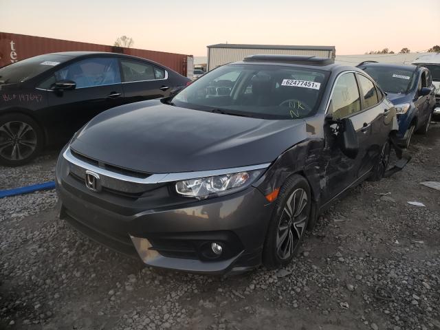 Photo 2 from auction – 2018 HONDA CIVIC EX with VIN JHMFC1F36JX022388
