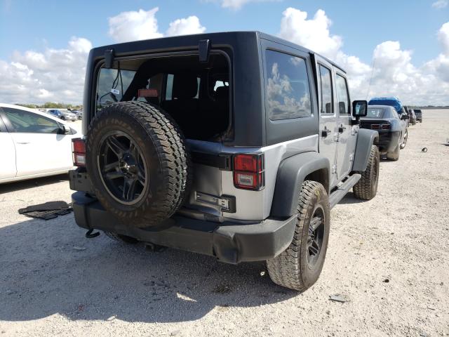 Photo 4 from auction – 2014 JEEP WRANGLER U with VIN 1C4BJWDG6EL320297