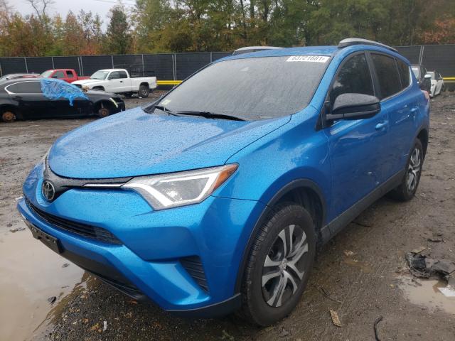 Photo 2 from auction – 2018 TOYOTA RAV4 LE with VIN JTMBFREV4JJ207373