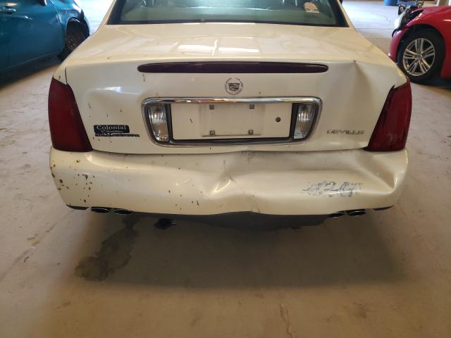 Photo 9 from auction – 2003 CADILLAC DEVILLE with VIN 1G6KD54Y13U268713