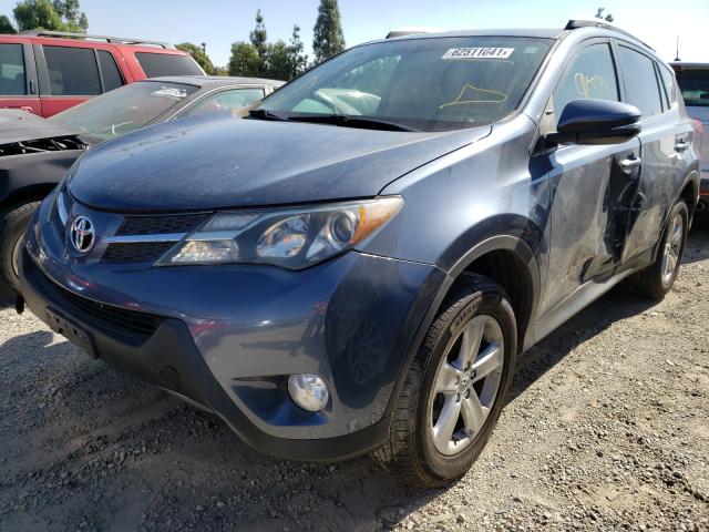 Photo 2 from auction – 2014 TOYOTA RAV4 XLE with VIN JTMWFREV2ED037889