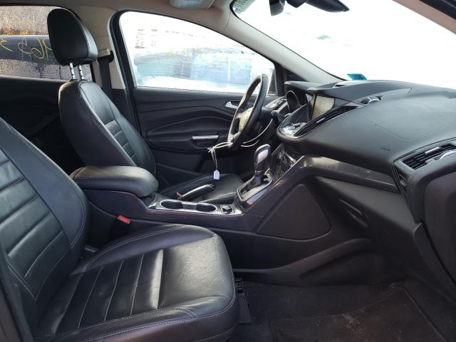 Photo 5 from auction – 2014 FORD ESCAPE TIT with VIN 1FMCU9JX9EUA09700