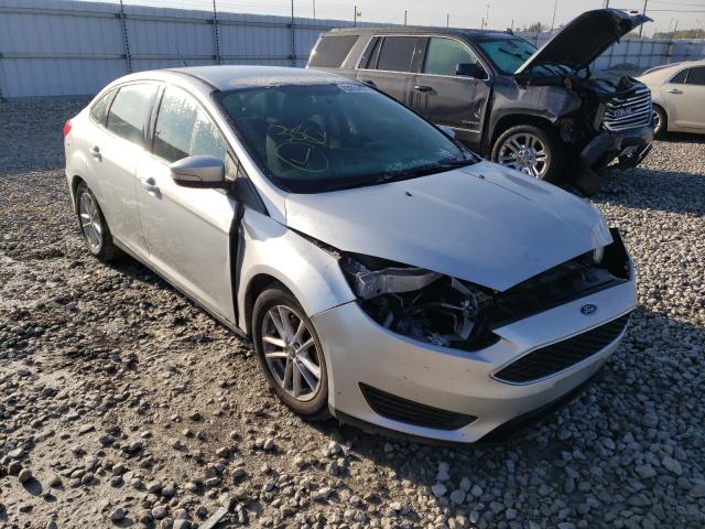 FORD FOCUS SE 2016 with VIN 1FADP3F23GL387410 - Photo from auction