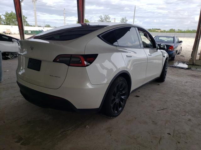 Photo 4 from auction – 2021 TESLA MODEL Y with VIN 5YJYGAEE0MF187644