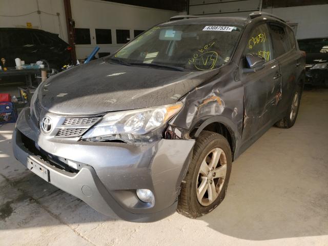 Photo 2 from auction – 2014 TOYOTA RAV4 with VIN JTMRFREV6ED071055