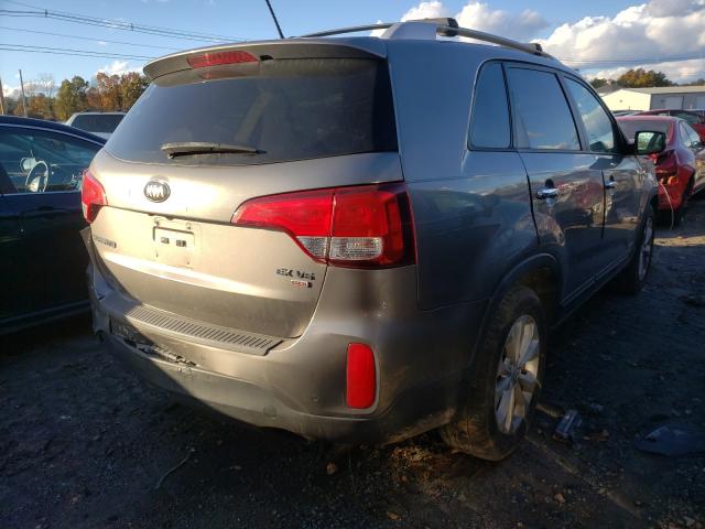 Photo 4 from auction – 2014 KIA SORENTO EX with VIN 5XYKUDA79EG498541
