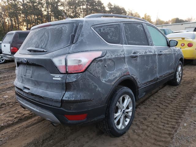 Photo 4 from auction – 2018 FORD ESCAPE SE with VIN 1FMCU0GDXJUA11801