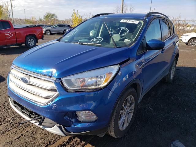 Photo 2 from auction – 2018 FORD ESCAPE SE with VIN 1FMCU9GD5JUB32207