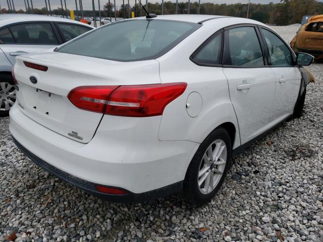 Photo 4 from auction – 2016 FORD FOCUS SE with VIN 1FADP3F29GL247684