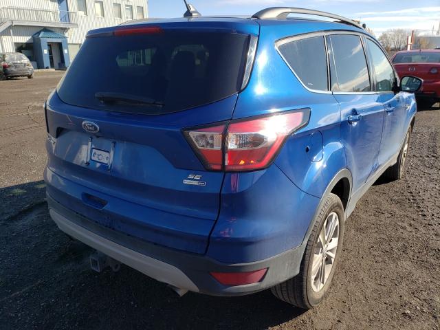 Photo 4 from auction – 2018 FORD ESCAPE SE with VIN 1FMCU9GD5JUB32207