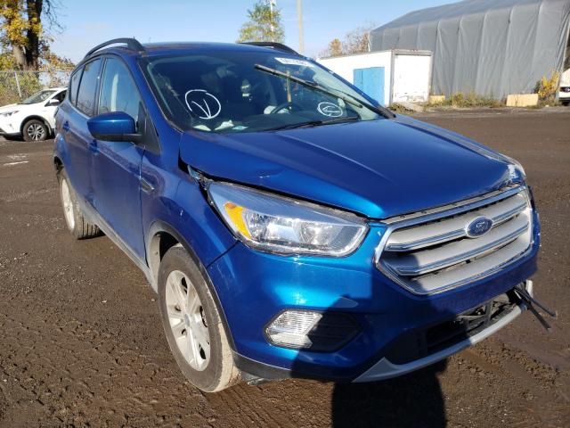 FORD ESCAPE SE 2018 with VIN 1FMCU9GD5JUB32207 - Photo from auction