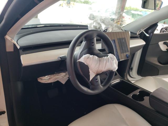 Photo 9 from auction – 2021 TESLA MODEL Y with VIN 5YJYGAEE0MF187644