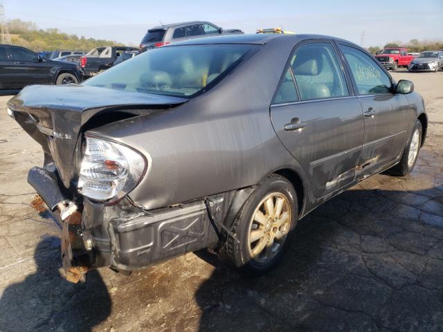Photo 4 from auction – 2004 TOYOTA CAMRY LE with VIN 4T1BE30K44U838412