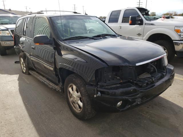 GMC ENVOY 2004 with VIN 1GKDT13S142132596 - Photo from auction