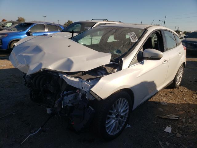 Photo 2 from auction – 2014 FORD FOCUS TITA with VIN 1FADP3N22EL397375