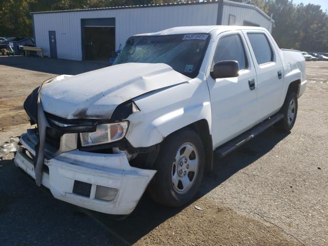 Photo 2 from auction – 2011 HONDA RIDGELINE with VIN 5FPYK1F20BB010759