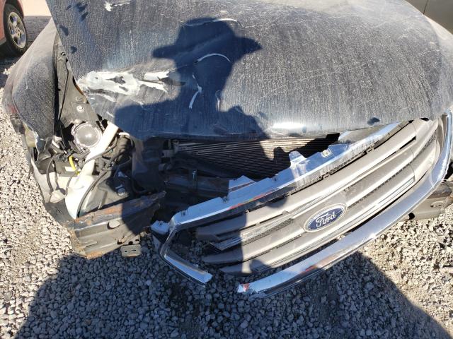 Photo 9 from auction – 2014 FORD TAURUS SEL with VIN 1FAHP2E80EG119311