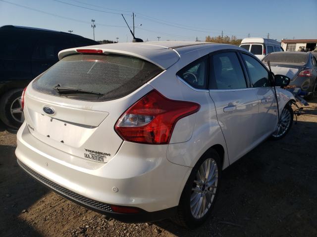 Photo 4 from auction – 2014 FORD FOCUS TITA with VIN 1FADP3N22EL397375