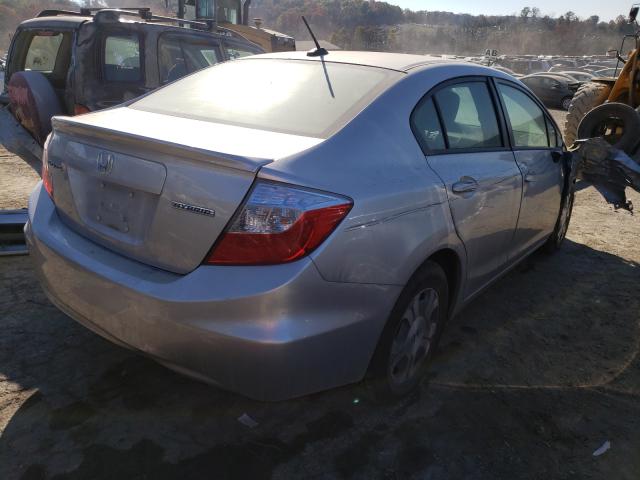 Photo 4 from auction – 2012 HONDA CIVIC HYBR with VIN JHMFB4F35CS002010