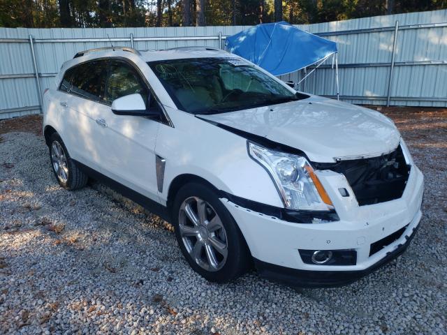 CADILLAC SRX PREMIU 2013 with VIN 3GYFNEE34DS556008 - Photo from auction