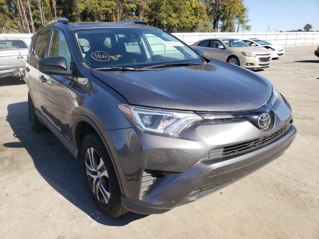 TOYOTA RAV4 LE 2018 with VIN 2T3ZFREV1JW461512 - Photo from auction