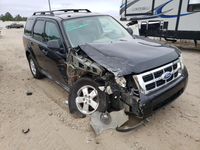 FORD ESCAPE XLT 2011 with VIN 1FMCU0D78BKC31224 - Photo from auction