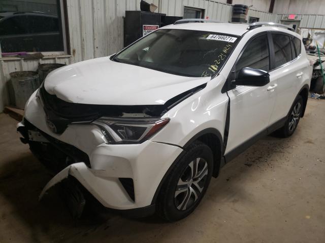 Photo 2 from auction – 2018 TOYOTA RAV4 LE with VIN JTMZFREV0JJ202931