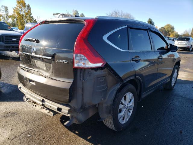 Photo 4 from auction – 2014 HONDA CR-V EXL with VIN 5J6RM4H78EL010358
