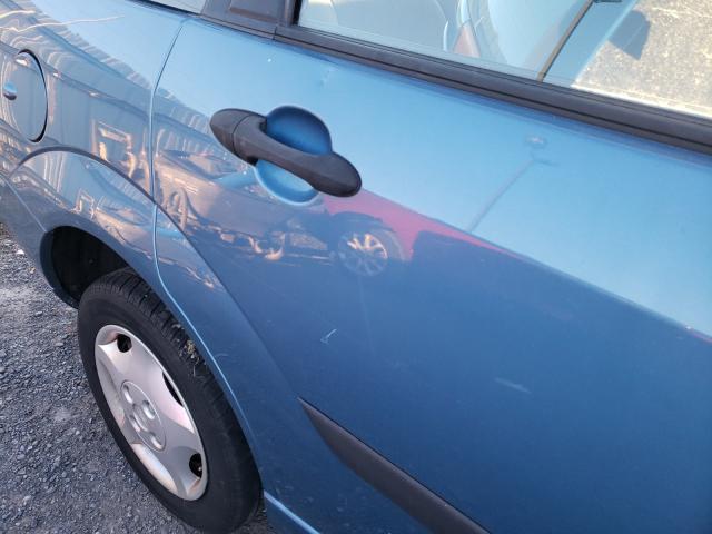 Photo 9 from auction – 2001 FORD FOCUS LX with VIN 1FAFP33P51W326509