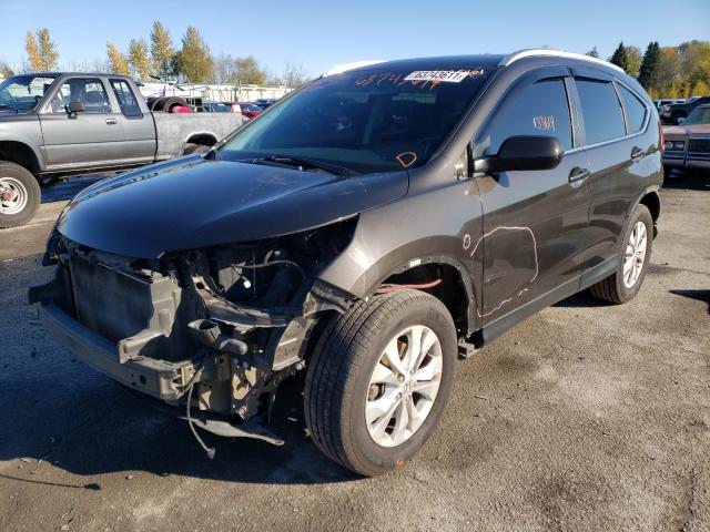 Photo 2 from auction – 2014 HONDA CR-V EXL with VIN 5J6RM4H78EL010358