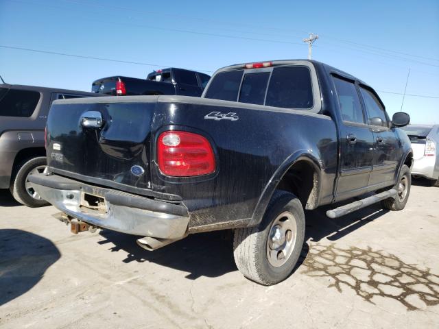 Photo 4 from auction – 2002 FORD F150 SUPER with VIN 1FTRW08L32KB46694