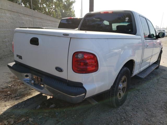 Photo 4 from auction – 2003 FORD F150 SUPER with VIN 1FTRW07673KB61180
