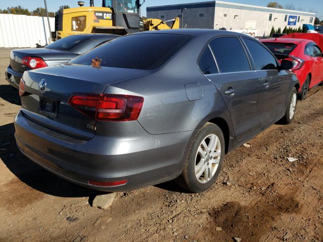 Photo 4 from auction – 2017 VOLKSWAGEN JETTA S with VIN 3VW2B7AJ4HM234554