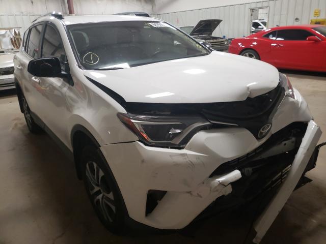 Photo 9 from auction – 2018 TOYOTA RAV4 LE with VIN JTMZFREV0JJ202931