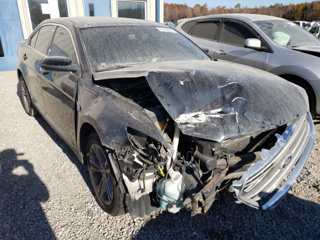 FORD TAURUS SEL 2014 with VIN 1FAHP2E80EG119311 - Photo from auction