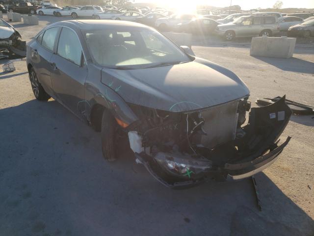 HONDA CIVIC EX 2018 with VIN 2HGFC2F71JH515086 - Photo from auction
