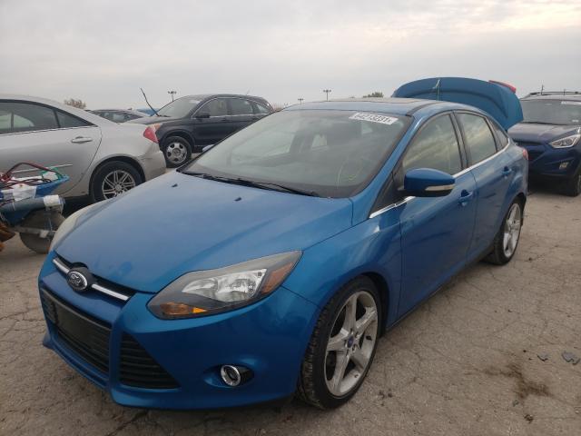 Photo 2 from auction – 2014 FORD FOCUS TITA with VIN 1FADP3J25EL106910