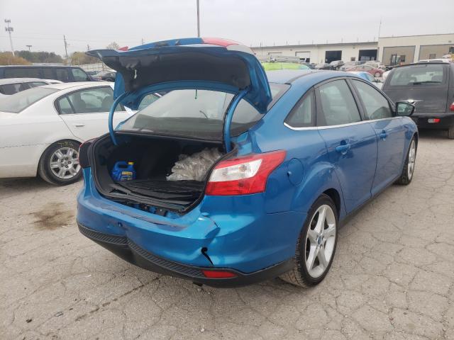 Photo 4 from auction – 2014 FORD FOCUS TITA with VIN 1FADP3J25EL106910