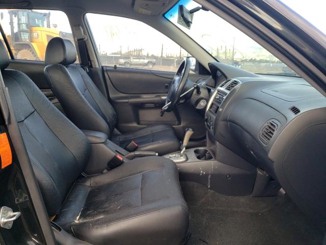 Photo 5 from auction – 2003 MAZDA PROTEGE with VIN JM1BJ246931208893