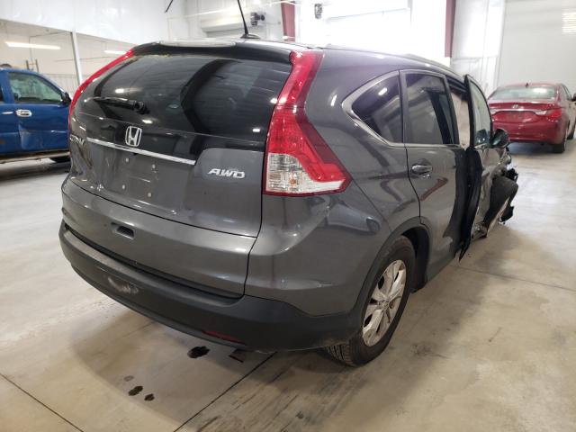 Photo 4 from auction – 2014 HONDA CR-V EXL with VIN 2HKRM4H79EH609473