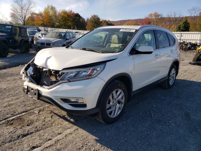 Photo 2 from auction – 2015 HONDA CR-V EXL with VIN 5J6RM4H71FL054252