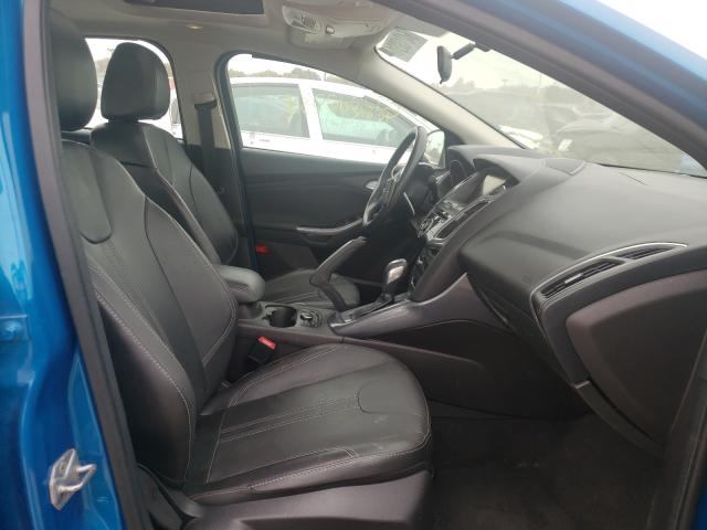 Photo 5 from auction – 2014 FORD FOCUS TITA with VIN 1FADP3J25EL106910