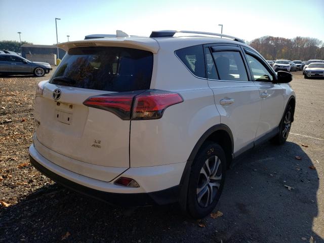 Photo 4 from auction – 2016 TOYOTA RAV4 LE with VIN JTMBFREV3GJ062528